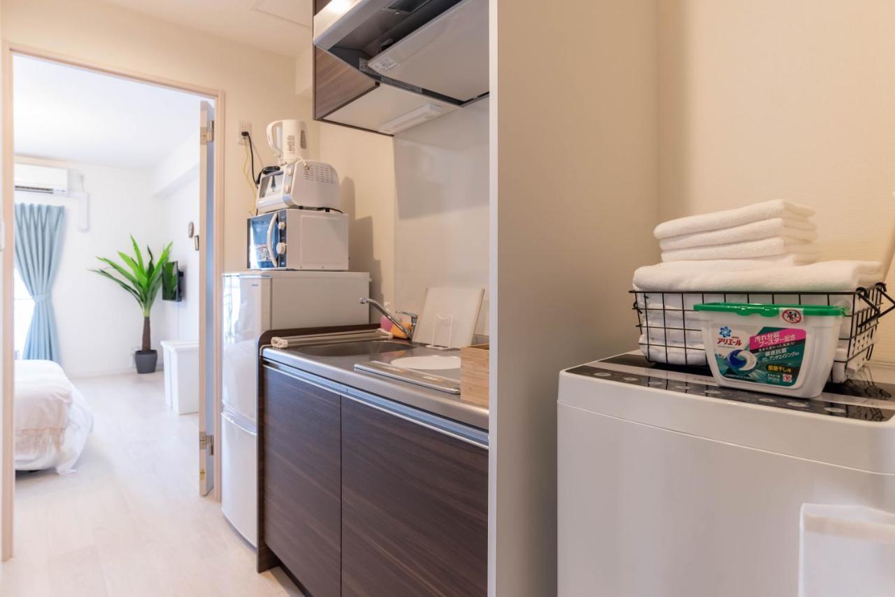 Bijou Suites Lieto Apm Осака Екстериор снимка
