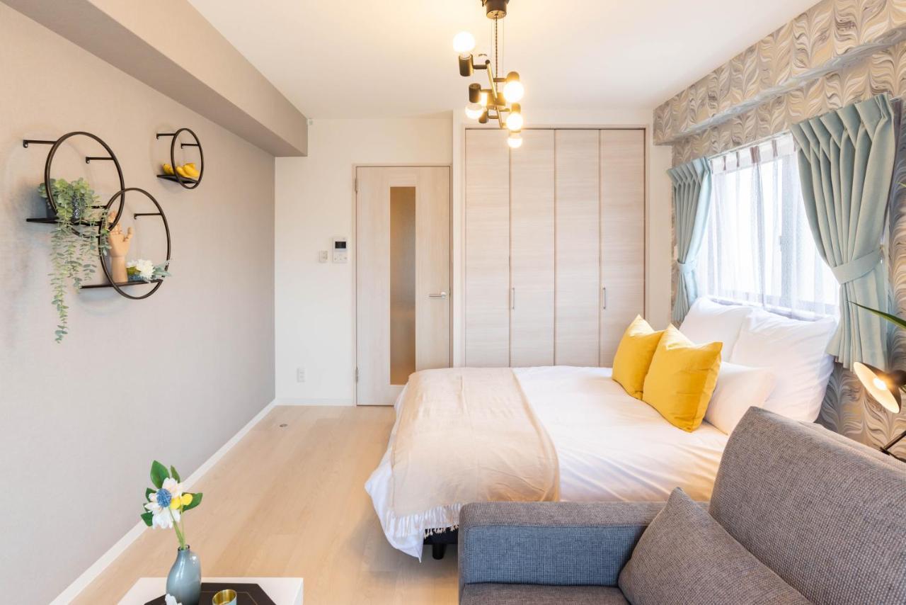 Bijou Suites Lieto Apm Осака Екстериор снимка