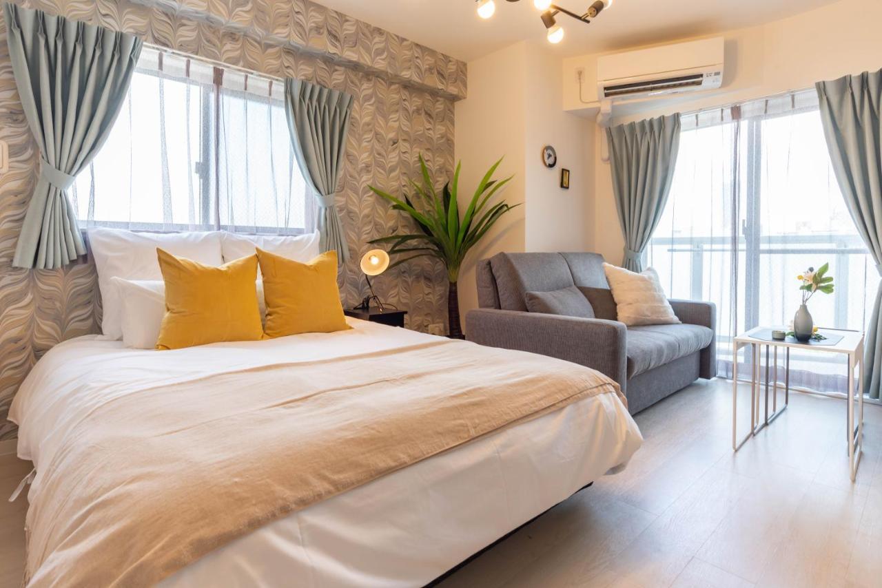 Bijou Suites Lieto Apm Осака Екстериор снимка