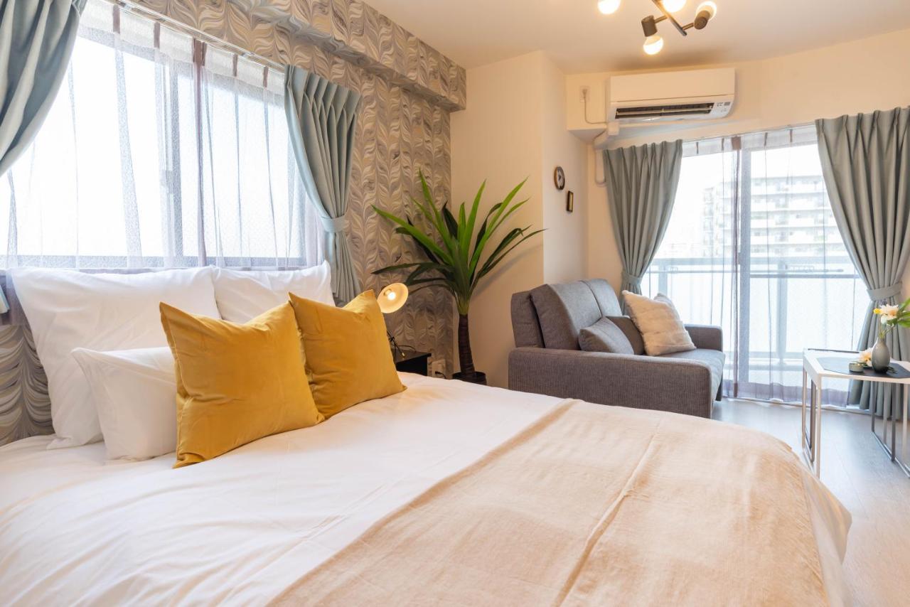 Bijou Suites Lieto Apm Осака Екстериор снимка